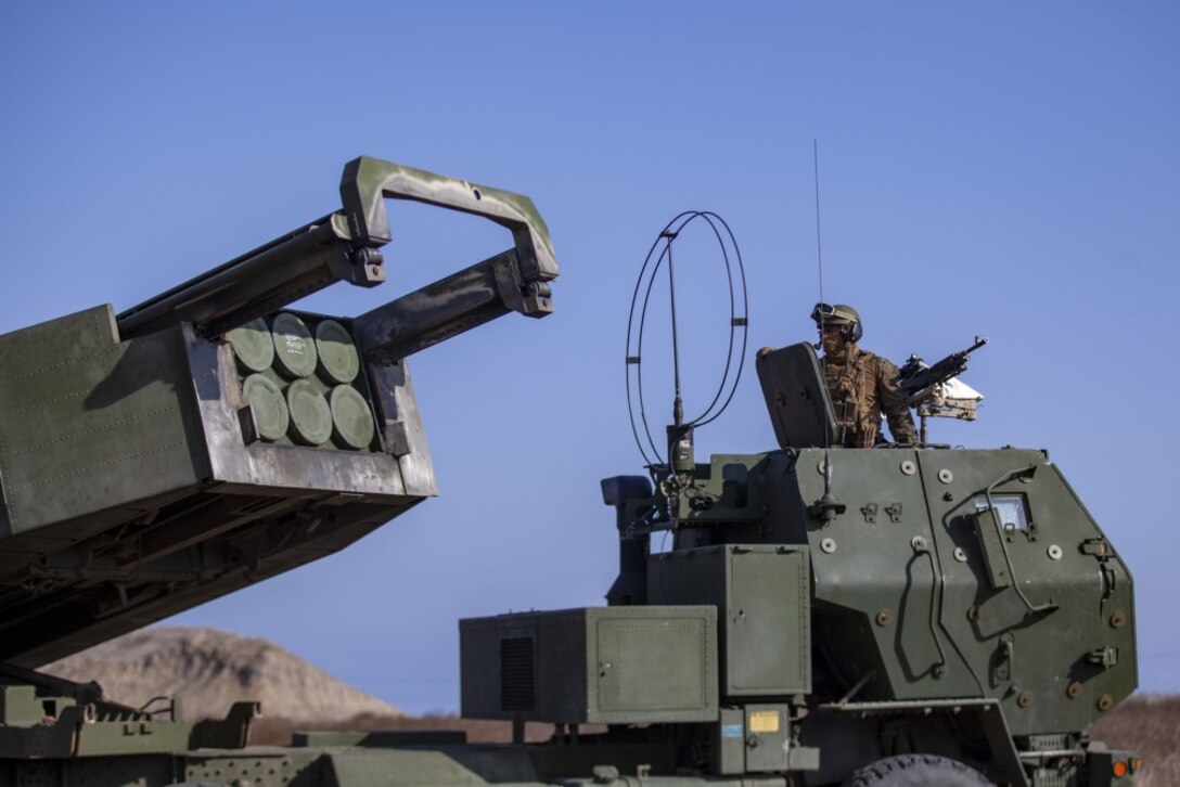 201010-M-UY835-1174 SAN CLEMENTE ISLAND, Calif. (Oct. 10, 2020) – U.S. Marine Corps Sgt. Alexander Clark, a launcher chief with India Battery, Battalion Landing Team 1/4, 15th Marine Expeditionary Unit, prepares a High Mobility Rocket Artillery System for a simulated fire mission during an expeditionary fires training event. The HIMARS is a truck mounted, rocket launcher, capable of accurately hitting precise targets over long distances. The Makin Island Amphibious Ready Group and the 15th MEU are currently conducting routine operations in the eastern Pacific Ocean. (U.S. Marine Corps photo by Cpl. Patrick Crosley)
