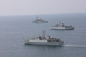 Royal Saudi Naval Force mine countermeasures vessel Al-Shaqra (MCMV 422), front, Royal Navy mine countermeasures vessel HMS Brocklesby (M 33), middle, and mine countermeasure ship USS Dextrous (MCM 13) sail in formation during mine countermeasures interoperability training, led by Commander, Task Force (CTF) 52 in the Arabian Gulf, Nov. 11. CTF 52 provides command and control of all mine warfare assets in the U.S. 5th Fleet area of operations. The 5th Fleet area of operations encompasses about 2.5 million square miles of water area and includes the Arabian Gulf, Arabian Sea, Gulf of Oman, Red Sea and parts of the Indian Ocean. The expanse is comprised of 20 countries and includes three critical choke points at the Strait of Hormuz, the Suez Canal and the Bab el-Mandeb Strait at the southern tip of Yemen.