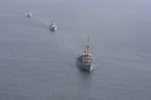 Mine countermeasure ship USS Dextrous (MCM 13), front, Royal Saudi Naval Force mine countermeasures vessel Al-Shaqra (MCMV 422), middle, and Royal Navy mine countermeasures vessel HMS Brocklesby (M 33) sail in formation during mine countermeasures interoperability training, led by Commander, Task Force (CTF) 52 in the Arabian Gulf, Nov. 11. CTF 52 provides command and control of all mine warfare assets in the U.S. 5th Fleet area of operations. The 5th Fleet area of operations encompasses about 2.5 million square miles of water area and includes the Arabian Gulf, Arabian Sea, Gulf of Oman, Red Sea and parts of the Indian Ocean. The expanse is comprised of 20 countries and includes three critical choke points at the Strait of Hormuz, the Suez Canal and the Bab el-Mandeb Strait at the southern tip of Yemen.