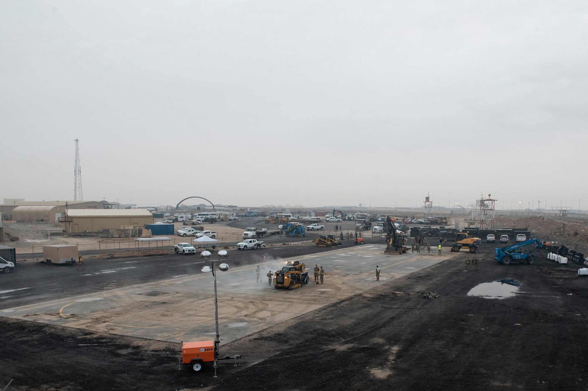 U.S. Air Force Airmen from the 386th Expeditionary Civil Engineer Squadron prepare for a Rapid Airfield Damage Recovery training exercise at Ali Al Salem Air Base, Kuwait, Nov. 16, 2020. During the exercise, multiple craters were repaired in a matter of hours allowing the simulated runway to become active again. (U.S. Air Force photo by Staff Sgt. Kenneth Boyton)