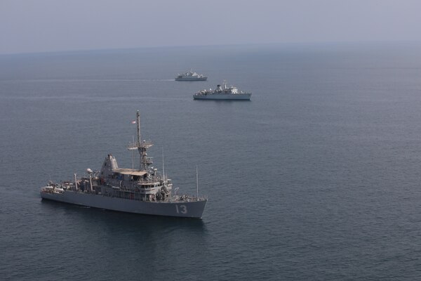 Mine countermeasure ship USS Dextrous (MCM 13), front, Royal Navy mine countermeasures vessel HMS Brocklesby (M 33), middle, and Royal Saudi Naval Force mine countermeasures vessel Al-Shaqra (MCMV 422) sail in formation during mine countermeasures interoperability training, led by Commander, Task Force (CTF) 52 in the Arabian Gulf, Nov. 11. CTF 52 provides command and control of all mine warfare assets in the U.S. 5th Fleet area of operations. The 5th Fleet area of operations encompasses about 2.5 million square miles of water area and includes the Arabian Gulf, Arabian Sea, Gulf of Oman, Red Sea and parts of the Indian Ocean. The expanse is comprised of 20 countries and includes three critical choke points at the Strait of Hormuz, the Suez Canal and the Bab el-Mandeb Strait at the southern tip of Yemen.