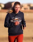 Master Sgt. Bonnie Ross, 7th Space Operations Squadron, works her way uphill after the final turn of the 19th annual Turkey Trot race Nov. 20, 2020, at Schriever Air Force Base, Colorado. Ross was the first female competitor to finish and did so in 22 minutes, 2 seconds.  (U.S. Space Force photo by Marcus Hill)