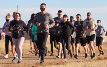 Runners begin the 19th annual Turkey Trot race Nov. 20, 2020, at Schriever Air Force Base, Colorado. The 2.5-mile race had 44 competitors participate and everyone received T-shirts upon completion. (U.S. Space Force photo by Marcus Hill)
