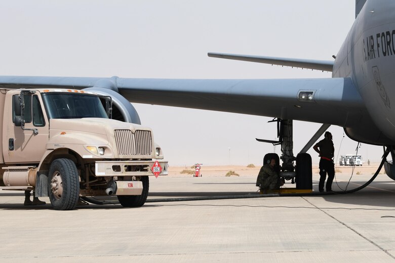 Fuels, maintenance Airmen perform hot pit refuel