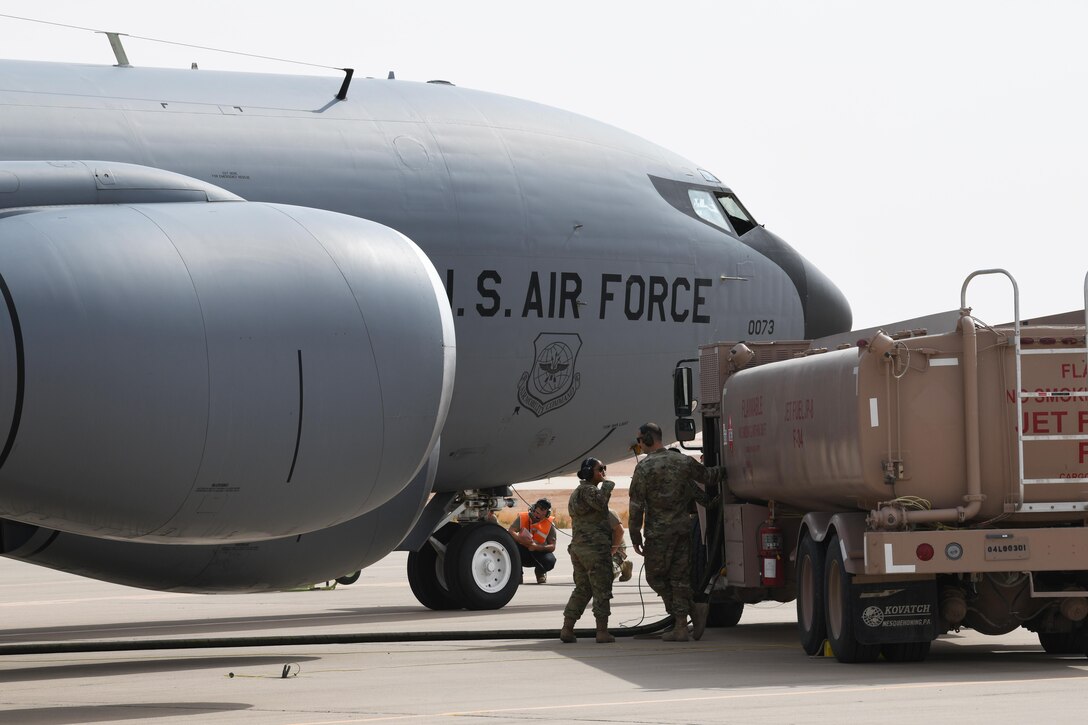 Fuels, maintenance Airmen perform hot pit refuel