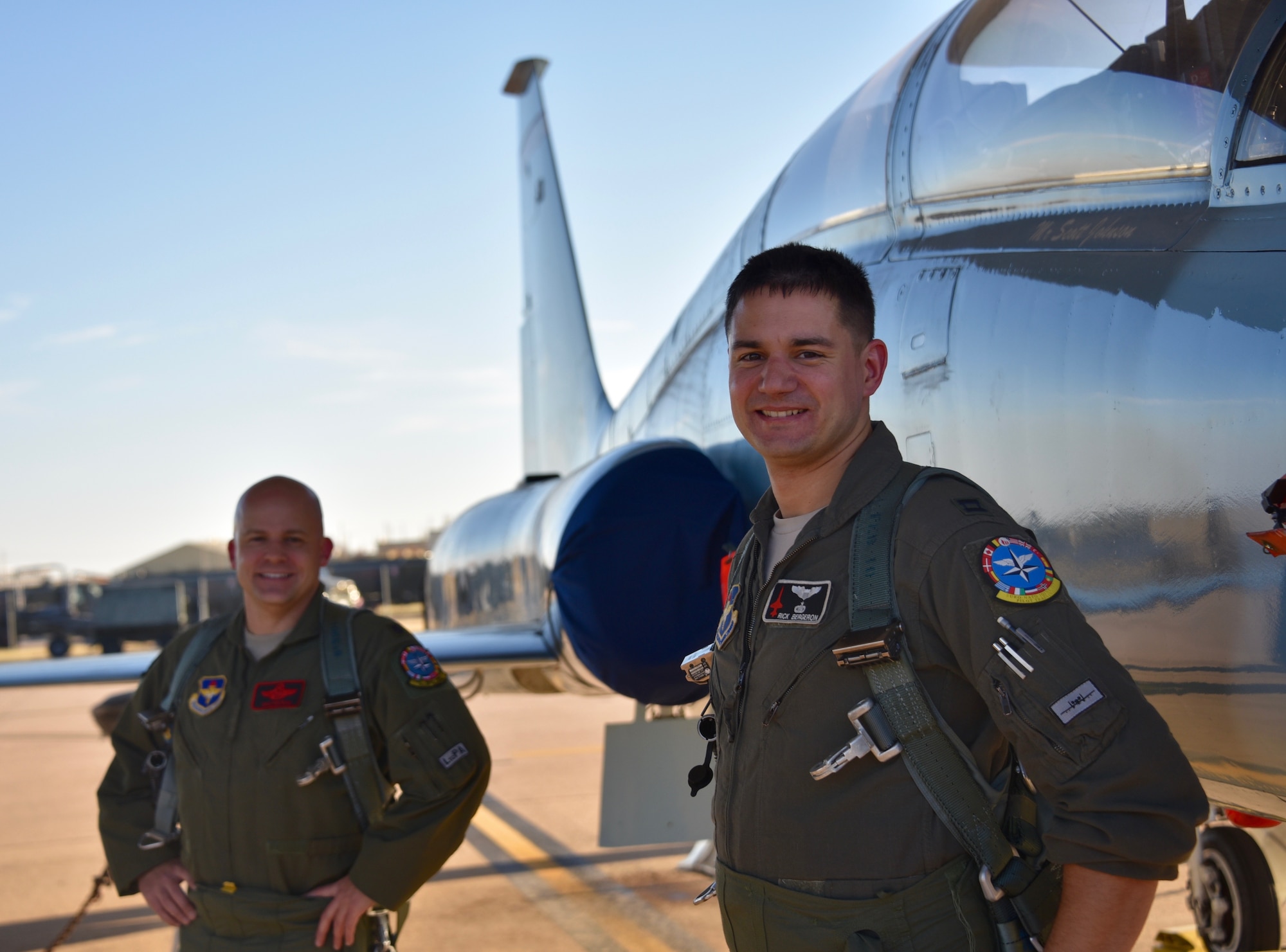 Lt. Col. Adam Markel, left, a seasoned F-16 seasoned fighter pilot, and Capt. Richard Bergeron, an Introduction to Fighter Fundamentals instructor pilot, pose for a photo at Sheppard Air Force Base, Texas, Nov. 18, 2020. Bergeron was 29 which exceeded the age requirement to begin his career in a rated field. Despite this, he decided he still wanted to try to earn a commission and chose to build off of his enlisted experience and become an intelligence officer. (Courtesy Photo)