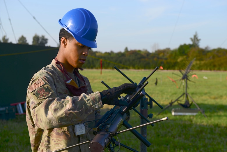 U.S. Air Force Staff Sgt. Cameron Hill, 606th Air Control Squadron plans and programs, deconstructs an AV211 antenna during exercise Astral Knight 20 at Malbork Air Base, Poland, Sept. 23, 2020. The 606th ACS was responsible for providing tactical command and control during the exercise. (U.S. Air Force photo by Tech. Sgt. Tory Cusimano)