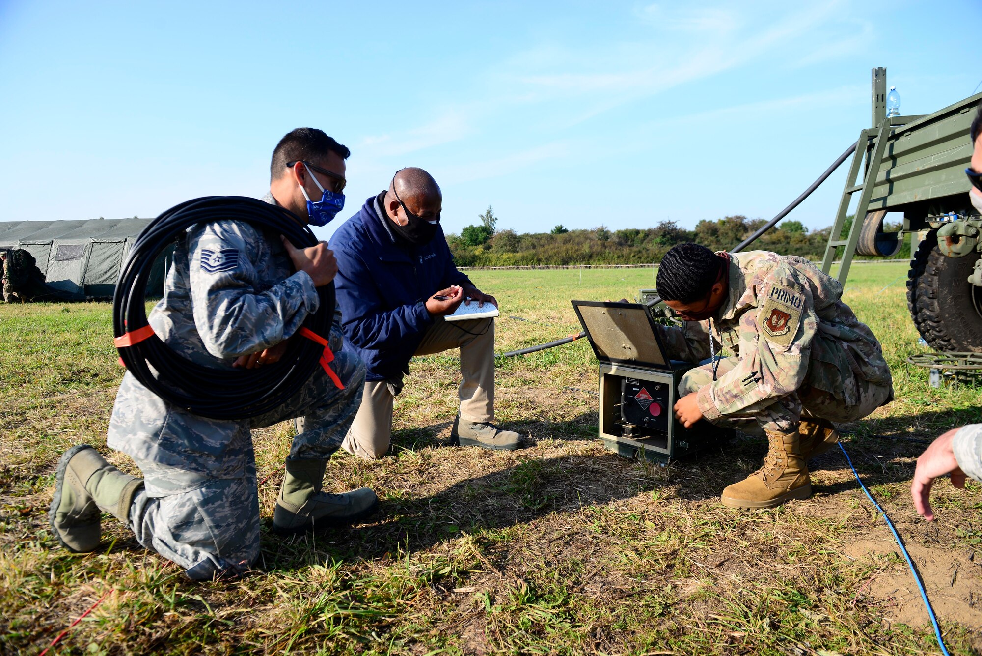 Members of the 606th Air Control Squadron radio frequency transmissions section conduct training on a high frequency coupler during exercise Astral Knight 20 at Malbork Air Base, Poland, Sept. 23, 2020. AK20 enhances our professional relationships and improves overall coordination with allies and partner militaries during times of crisis.(U.S. Air Force photo by Tech. Sgt. Tory Cusimano)