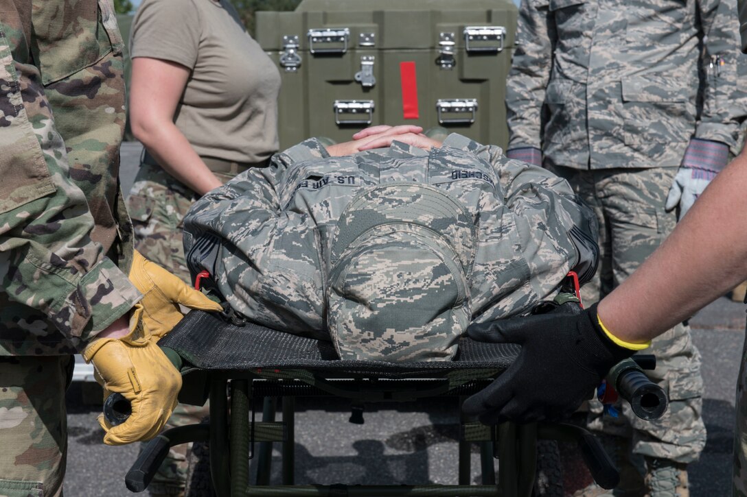 Citizen Airmen with the 932nd, 910th and 302nd Airlift Wing’s participate in Operation Centennial Summit, Peterson Air Force Base, Colorado, Sept. 15, 2020. Operation Centennial Summit gave members the opportunity to get hands-on training such as litter carry procedures, triage, self-aid and buddy care, respiratory distress and numerous lectures on other medical emergencies. The 932nd AW is a reserve unit at Scott Air Force Base, Illinois. (U.S. Air Force photo by Staff Sgt. Melissa Estevez)