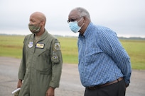 Col. Jaron Roux, 437th Airlift Wing commander, left, and Mayor Julius Jones, mayor of North S.C., right, stand on the runway of North Auxiliary Airfield Sept. 28, 2020, in North, S.C. While visiting NAAF, Joint Base Charleston leadership toured the infrastructure and facilities of the 2,400 acre airfield on the outskirts of a town with a population of less than 1,000 people and discussed the strategic advantage the training ground plays for Joint Base Charleston, Air Mobility Command, the DoD and other mission partners. (U.S. Air Force photo by Senior Airman Joshua R. Maund)