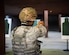U.S. Air Force Staff Sgt. Desmond Bonaparte, 633rd Security Forces Squadron response force leader, fires the M18 at a target during qualification testing at Joint Base Langley-Eustis, Virginia, Sept. 24, 2020.