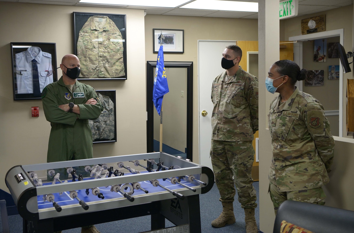 U.S. Air Force Col. David Berkland, the 354th Fighter Wing commander, talks with Airman Leadership School (ALS) instructors during a wing leadership immersion on Eielson Air Force Base, Alaska, Sept. 29, 2020. The ALS instructors are responsible for teaching senior Airmen their role as military supervisors and how they will contribute to the overall goals and mission of the Air Force.(U.S. Air Force photo by Senior Airman Beaux Hebert)