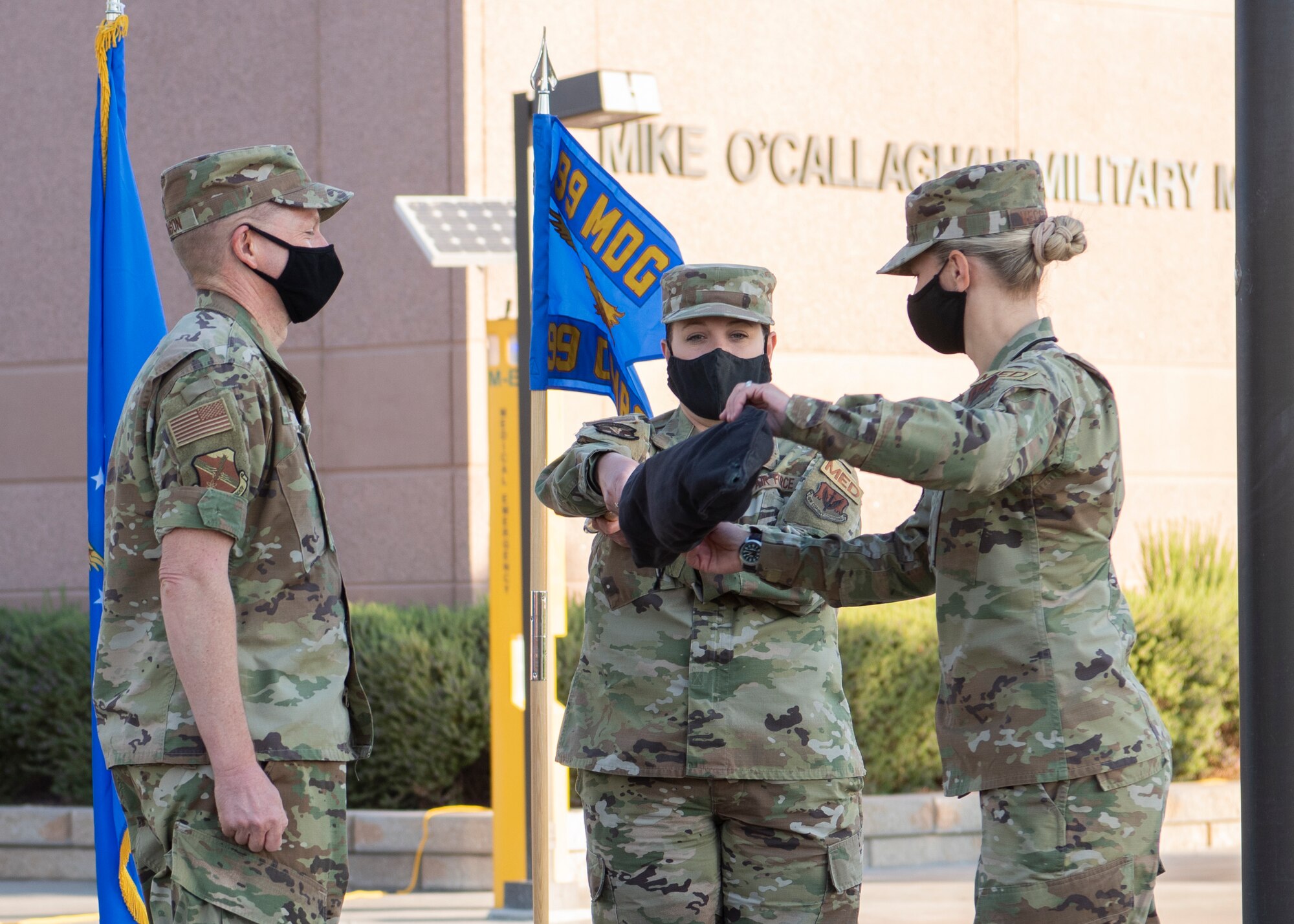 Airman unveils new squadron flag