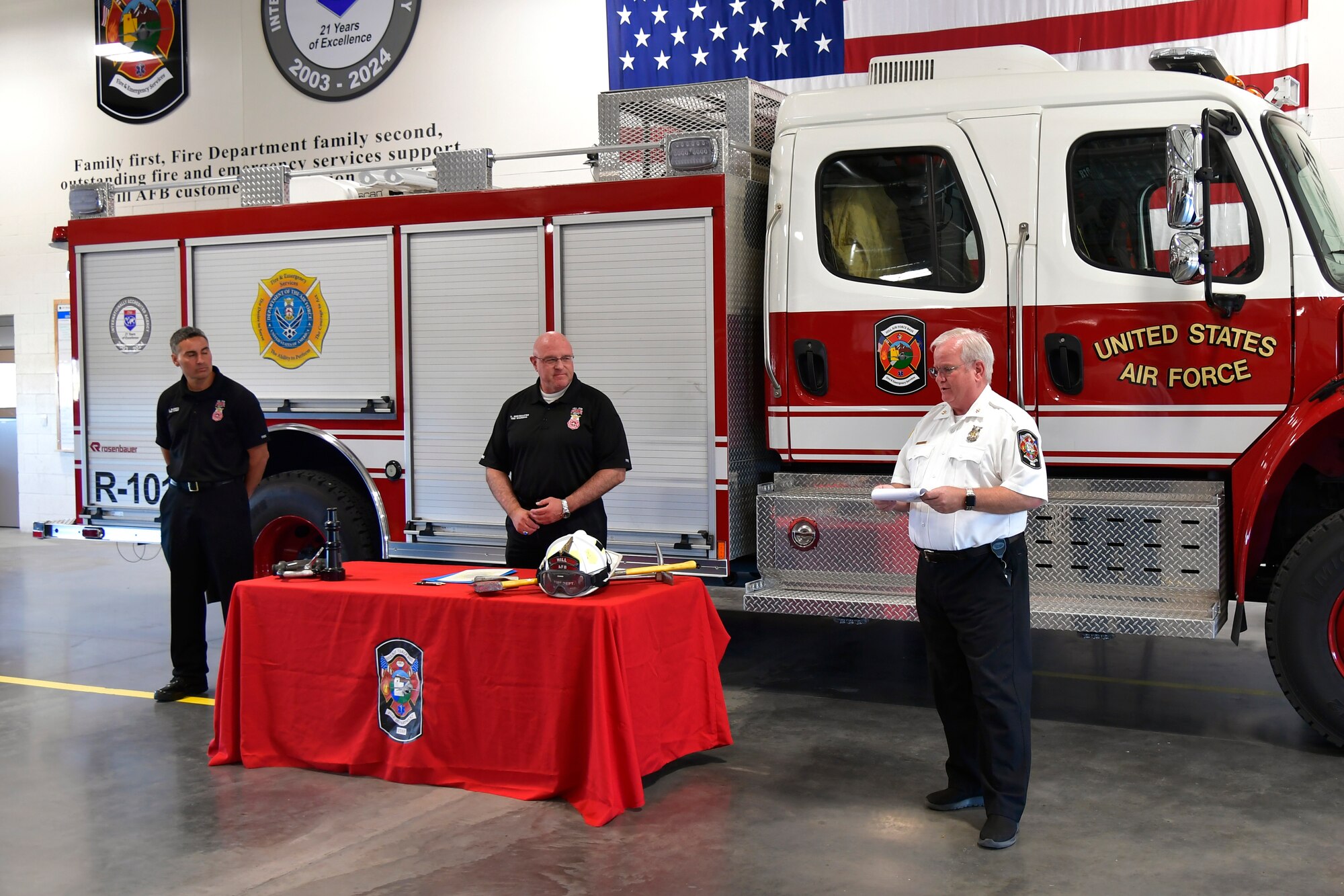 (Left to right) Javie Blanco, 775th Civil Engineer Squadron fire chief, Harry Briesmaster, 75th Civil Engineer Group director and fire marshal, and Jeffrey Beck, 775th CES assistant for chief fire prevention, provide opening remarks during the signing of the base’s Fire Prevention Week proclamation.
