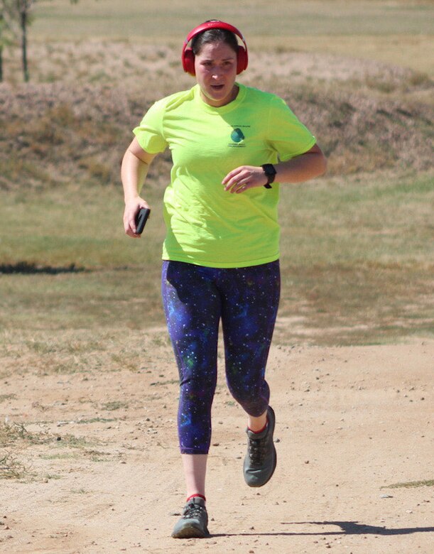 Kelly Malone, 2nd Space Operations Squadron, begins the 5K portion of the second annual dry triathlon Sept. 25, 2020, at Schriever Air Force Base, Colorado. The event had 14 competitors and participants earned T-shirts upon completion of the race. (U.S. Air Force photo by Marcus Hill)