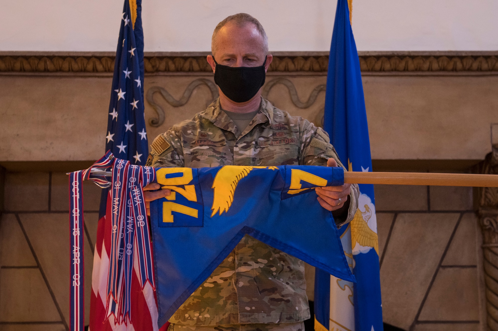 image of the 17th special tactics squadron's transition ceremony at a hall in Fort Benning, Georgia