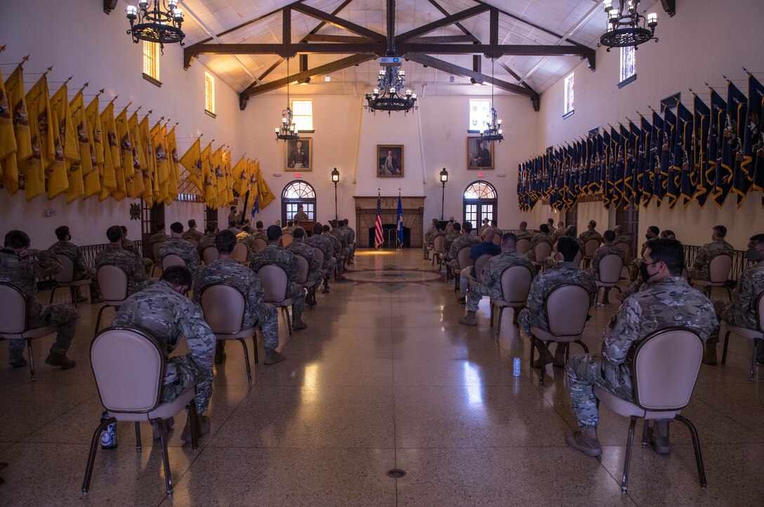 image of the 17th special tactics squadron's transition ceremony at a hall in Fort Benning, Georgia