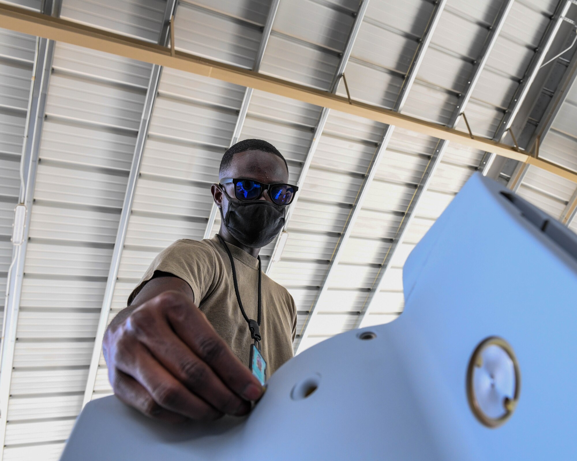 Airman Haji Williams, 56th Equipment Maintenance Squadron munitions systems technician, prepares a GBU-12 Paveway II laser-guided bomb tail kit for installation Sept. 20, 2020, at Luke Air Force Base, Arizona.
