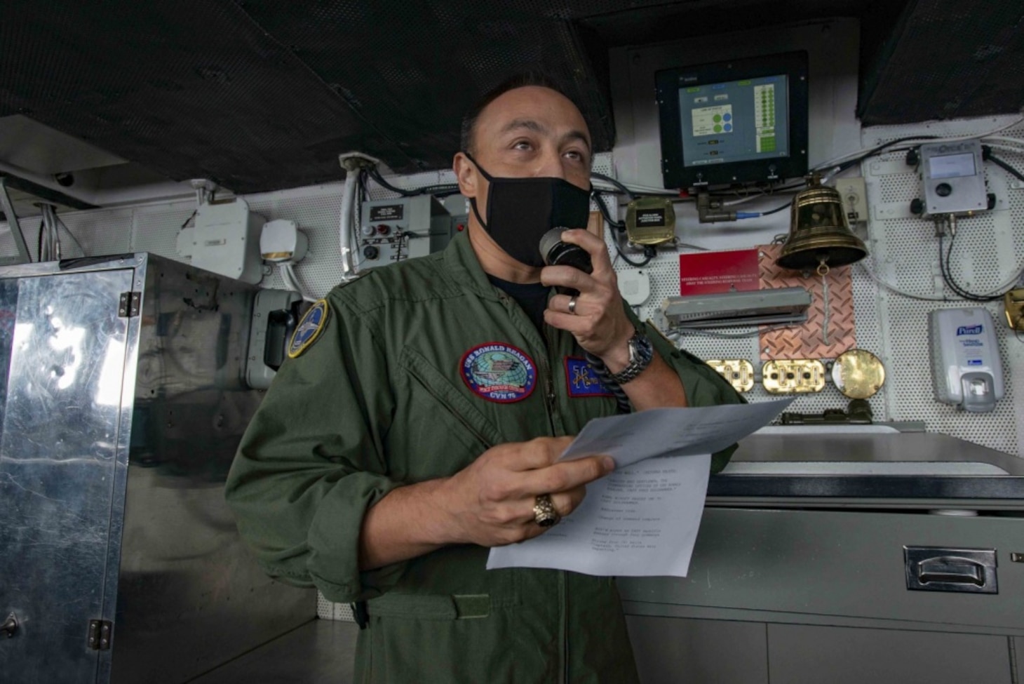 PHILIPPINE SEA (Oct. 1, 2020) Capt. Fred Goldhammer, commanding officer of the Navy’s only forward-deployed aircraft carrier USS Ronald Reagan (CVN 76), addresses his crew during a change-of-command ceremony in the pilot house. Ronald Reagan, the flagship of Carrier Strike Group 5, provides a combat-ready force that protects and defends the United States, as well as the collective maritime interests of its allies and partners in the Indo-Pacific region.
