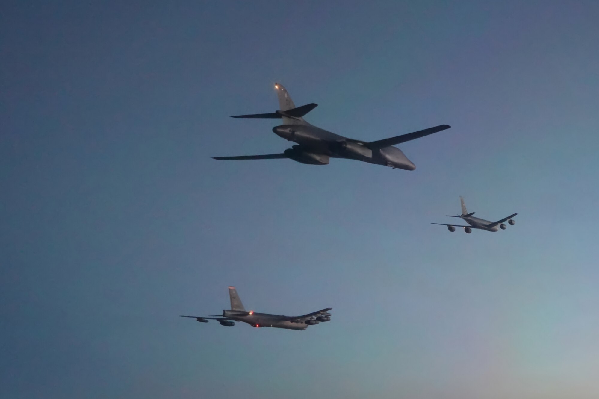 Photo of B-1 and B-52 flying behind KC-135