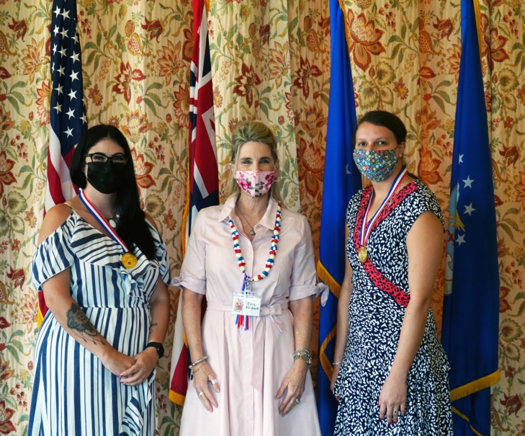 Mrs. Cindy Wilsbach, spouse of Gen. Ken Wilsbach, stands with Spouse Volunteer award winners, Mrs. Lexi Brown and Mrs. Caroline McGrath, at the Ka Makani Community Center, Joint Base Pearl Harbor-Hickam, Hawaii, Sept. 28, 2020. These military spouses displayed leadership and forward-thinking, and based on their contributions were nominated by their spouses’ units to earn these awards. (U.S. Air Force photo by Airman 1st Class Erin Baxter)