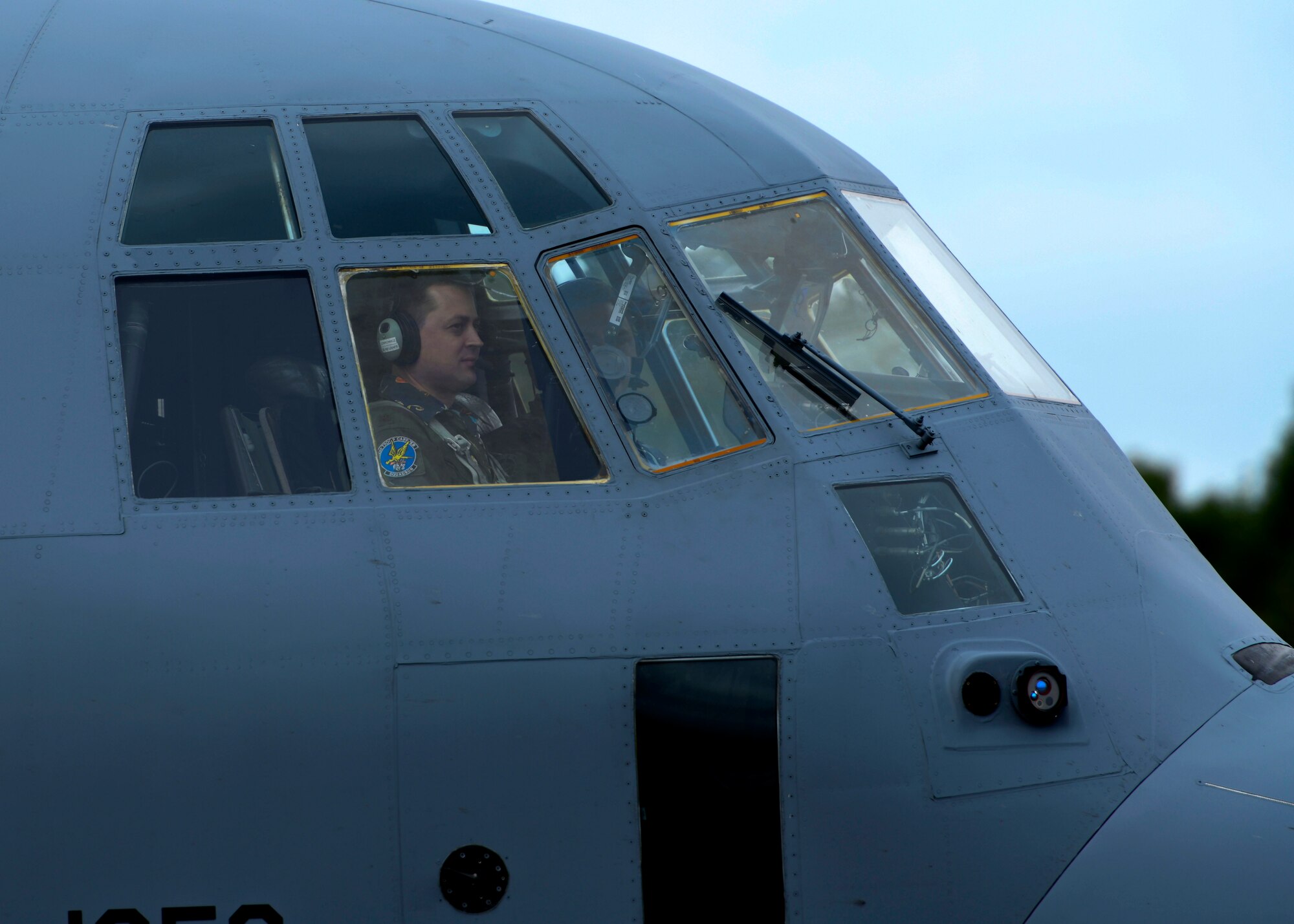 Pilots prepare to take off on the flight line