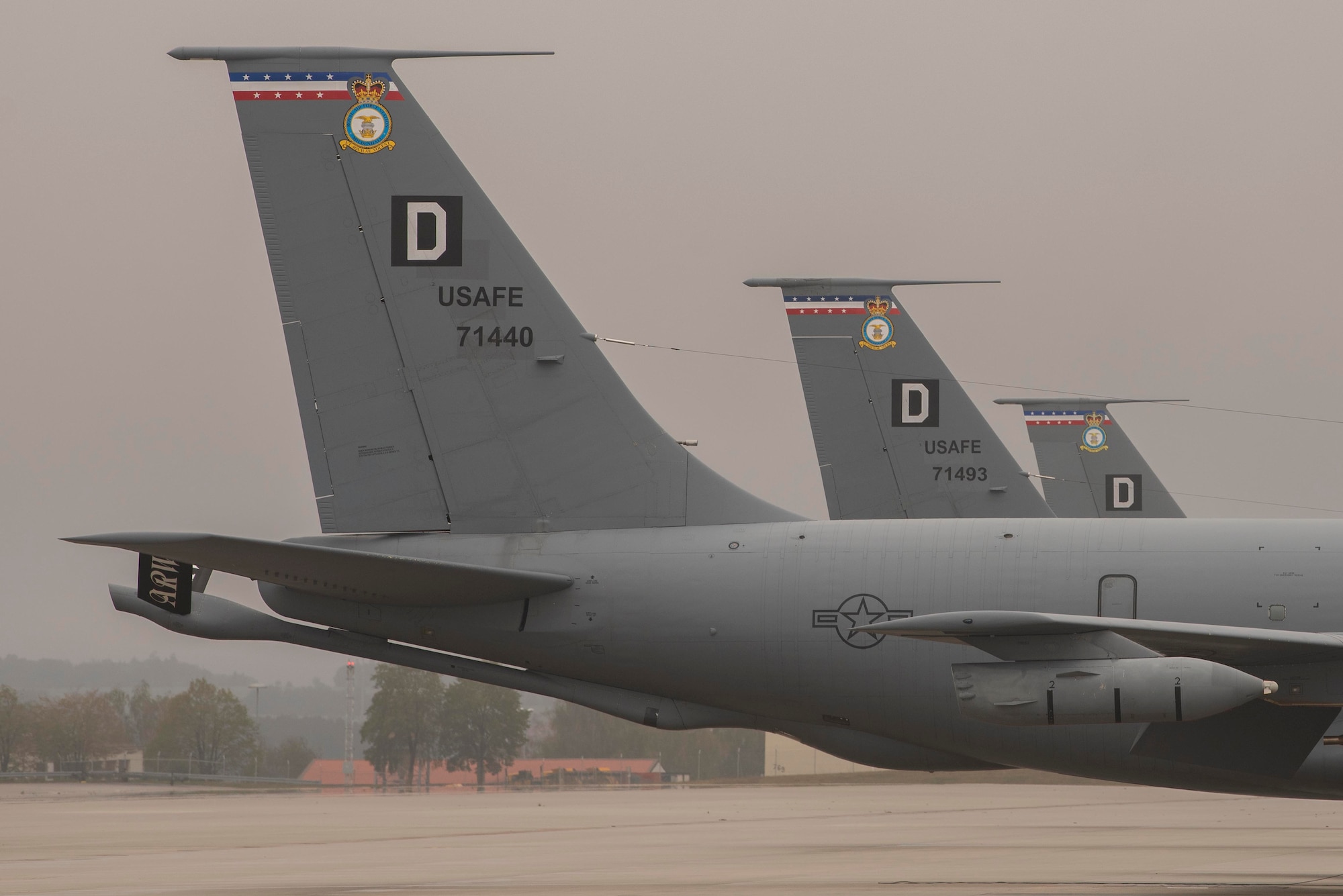 Three U.S. Air Force KC-135 Stratotanker aircraft, assigned to the 100th Air Refueling Wing, Roy-al Air Force Mildenhall, England, sit on the flightline before conducting air-refueling operations during Exercise Wolff Pack at Spangdahlem Air Base, Germany, Sept. 30, 2020. Aircraft were dis-persed throughout Europe to test the 100th ARW’s ability to generate rapid aerial refueling capabil-ity from a diverse set of air bases. (U.S. Air Force photo by Airman 1st Class Joseph Barron)