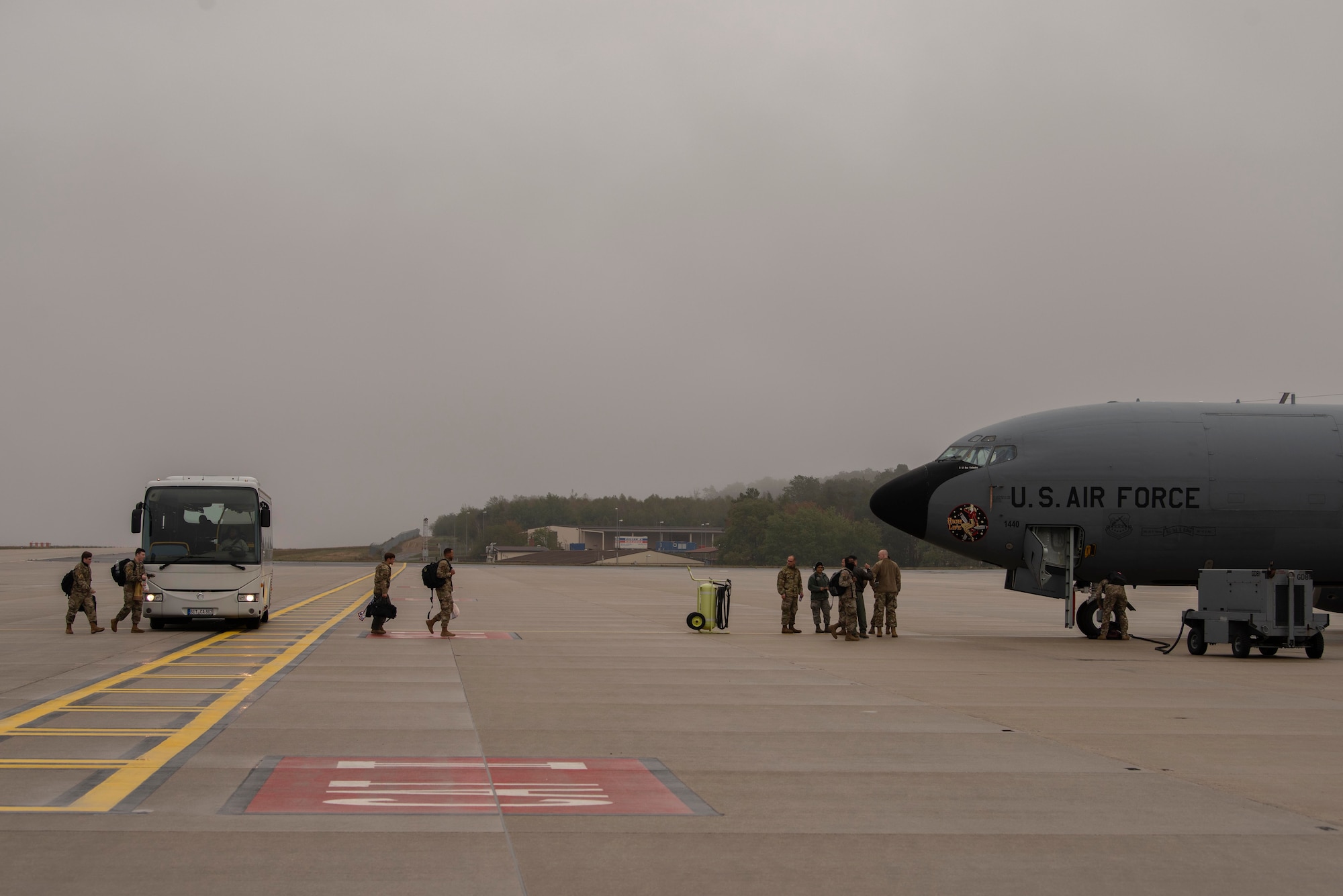 Airmen assigned to the 100th Air Refueling Wing, Royal Air Force Mildenhall, England, prepare to board a U.S. Air Force KC-135 Stratotanker aircraft during Exercise Wolff Pack at Spangdahlem Air Base, Germany, Sept. 30, 2020. The 100th ARW provided air refueling capability from diverse operating locations in Europe with varying levels of support to enable lethal combat airpower with-in the U.S. Air Forces in Europe-Air Forces Africa area of responsibility. (U.S. Air Force photo by Airman 1st Class Joseph Barron)