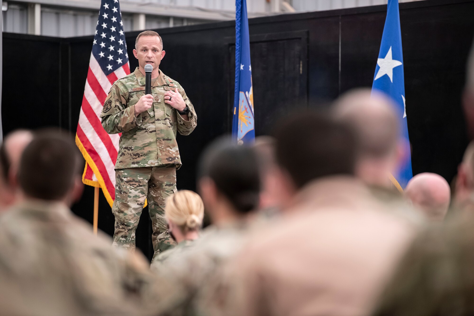Chief Master Sgt. John Storms, U.S. Air Forces Central command chief, speaks to joint personnel during an all-call at Al Dhafra Air Base, United Arab Emirates, Sept. 27, 2020.