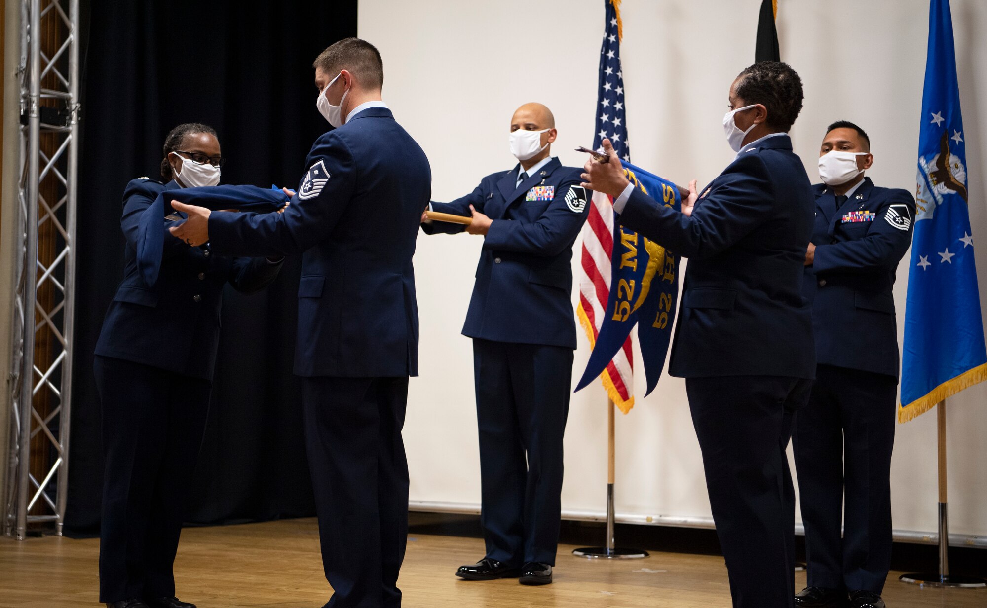 The ceremony re-designated the squadron as the 52nd Health Care Operations Squadron