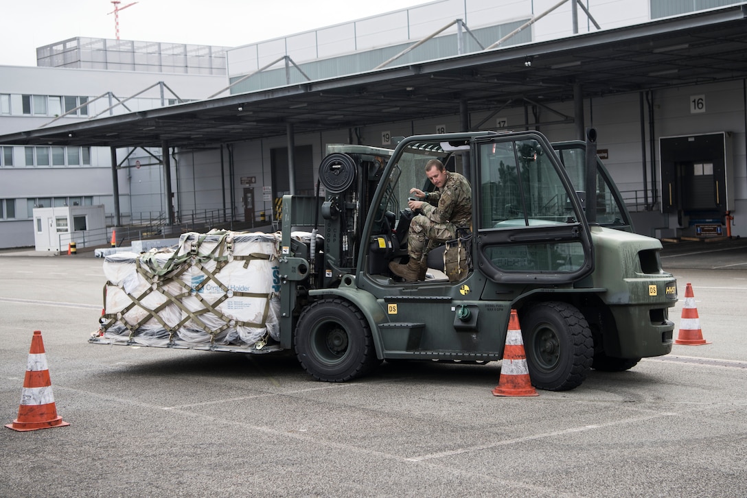U.S. Air Force Tech. Sgt. Richard Ton, 721st Aircraft Maintenance Squadron crew chief, practices pallet operations in a 10k forklift.