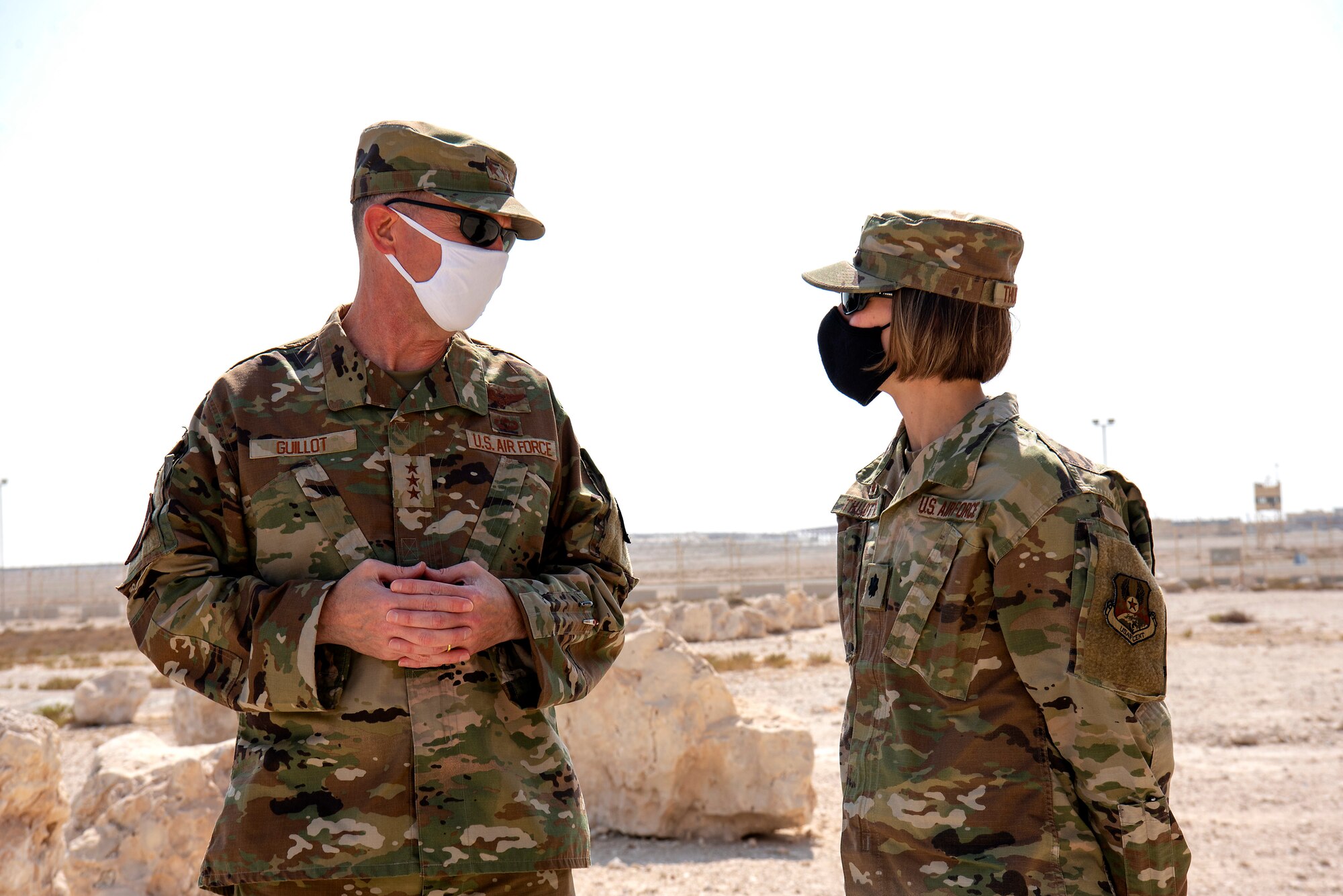 U.S. Air Force Lt. Gen. Greg Guillot, U.S. Air Forces Central commander, speaks with Lt. Col. Renee Thoutte, 379th Expeditionary Force Support Squadron commander, during his troop engagement with the 379th Air Expeditionary Wing at Al Udeid Air Base, Qatar, Sept. 28, 2020. During his visit, Guillot interacted with Airmen and recognized outstanding performers in support of the wing and operations across the region.