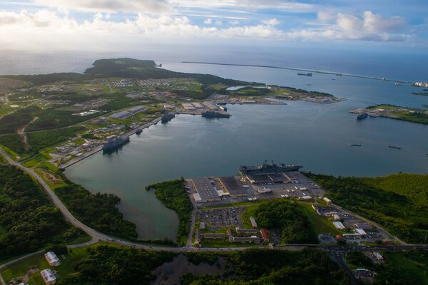 Amphibious assault ship USS America (LHA 6), San Antonio-class amphibious transport dock ship USS New Orleans (LPD 18), and Whidbey Island-class dock landing ship USS Germantown (LSD 42), all part of the America Expeditionary Strike Group, sit pier side in Apra Harbor at Naval Base Guam. This port visit ensures the force remains at the highest level of readiness to support the U.S. 7 th Fleet’s mission of security and stability in the Indo-Pacific.
