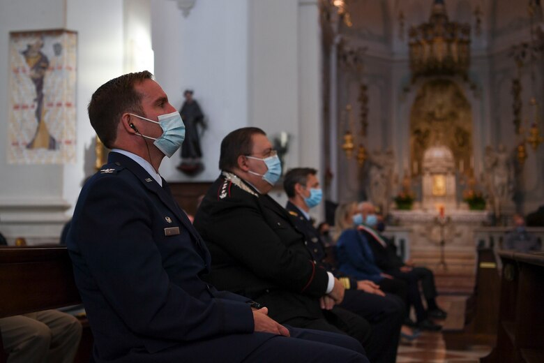 U.S. Air Force and Italian air force leadership attend holy mass in Pordenone, Italy, Sept. 29, 2020. A Madonna Di Loreto statue was on display during holy mass in the churches of Roveredo in Piano, Aviano, and Pordenone to give the local population a unique opportunity to see the holy statue. (U.S. Air Force photo by Staff Sgt. Savannah L. Waters)