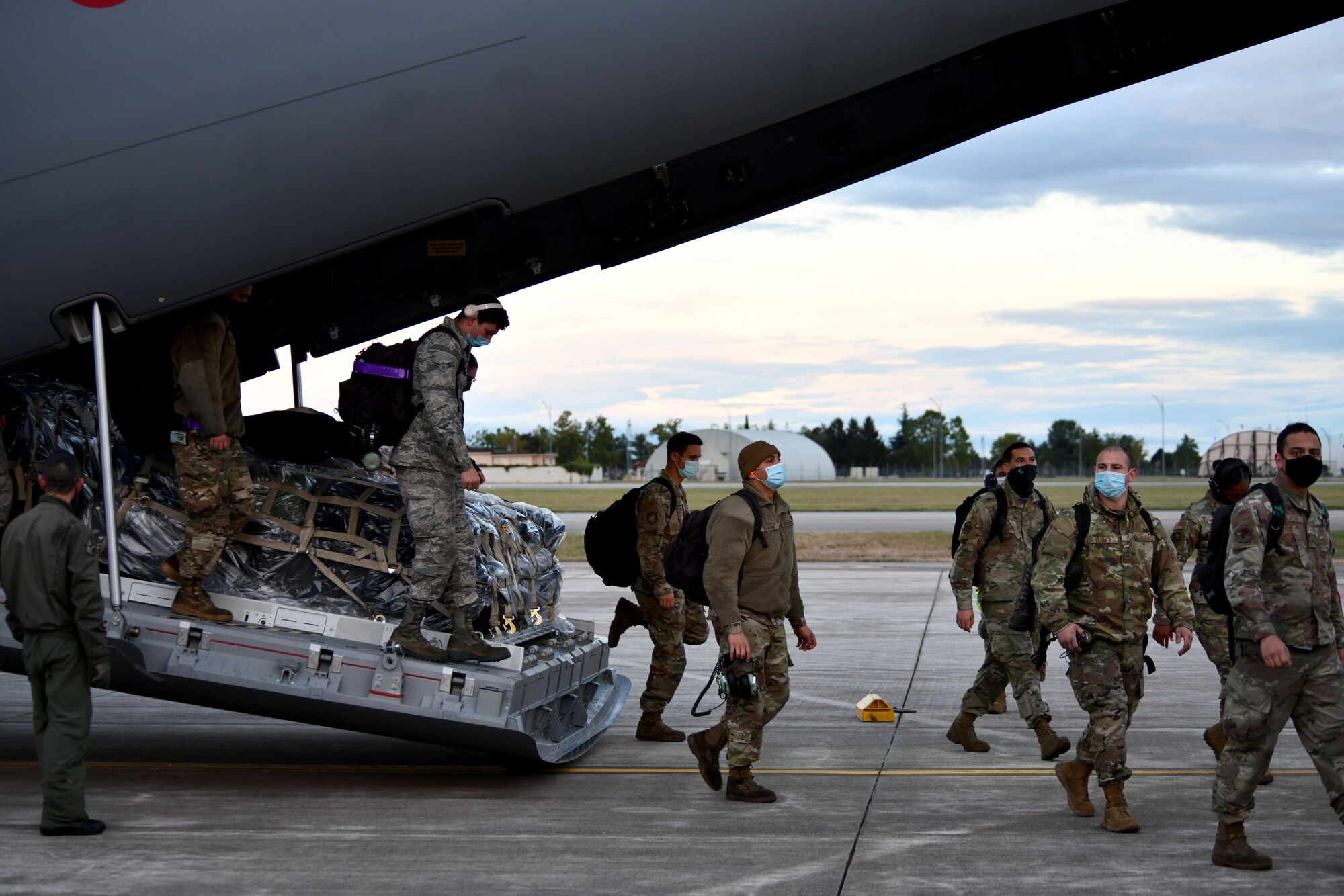 U.S. Airmen assigned to the 31st Aircraft Maintenance Squadron and 510th Fighter Squadron disembark from a Spanish air force Airbus A400M at Aviano Air Base, Italy, Sept. 28, 2020. The airmen returned from a four-week flying training deployment to Royal Air Force Lakenheath, United Kingdom. (U.S. Air Force photo by Staff Sgt. K. Tucker Owen)