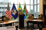 Maj. Amy Crounse, New York National Guard State Partnership Program officer, begins a videoconference with representatives from Brazil to discuss how the two sides responded to COVID-19, New York National Guard Headquarters, Latham, N.Y., Sept. 29, 2020. The New York Guard and Brazil's military work together under the State Partnership Program.