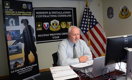 Jim Keetch leads a virtual advanced planning briefing to industry from his office earlier this summer at Dugway Proving Ground, Utah. Challenges posed by COVID-19 and subsequent transition to a remote work environment did not deter Mission and Installation Contracting Command personnel from meeting critical installation readiness contract needs. Keetch is director of contracting for MICC-Dugway Proving Ground.