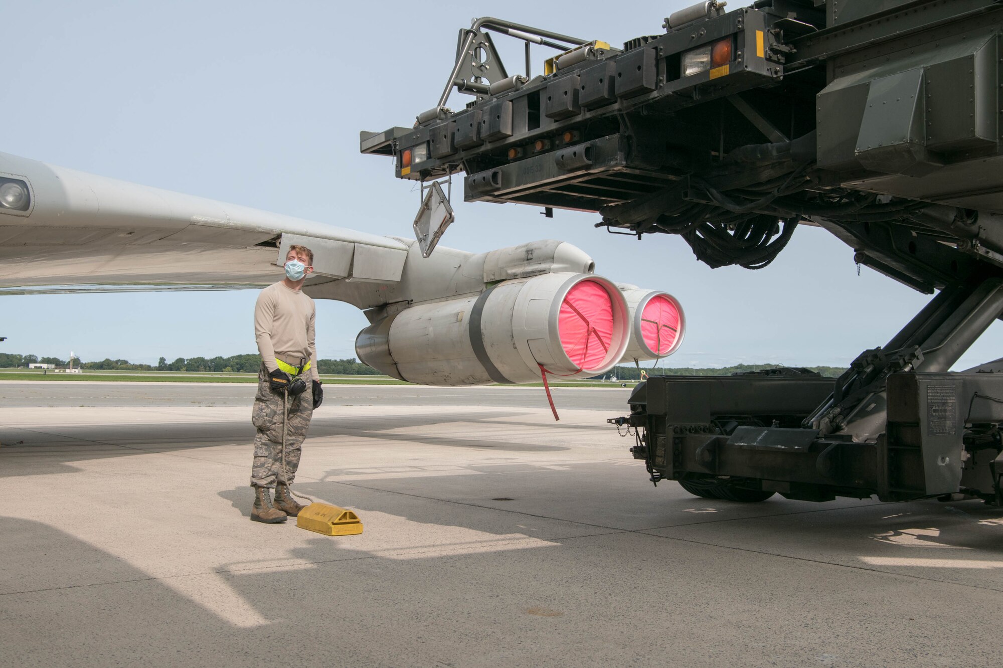 Airman 1st Class Matthew Bolinger, 436th Aerial Port Squadron ramp coordinator, watches as a K-loader approaches an Israeli air force Boeing 707 Sept. 15, 2020, at Dover Air Force Base, Delaware. The Israeli aircraft was at Dover AFB to pick up equipment as part of a foreign military sales operation. Over the past 70 years, the U.S. and Israel have developed unbreakable bonds through cooperation in security, economics and business, scientific research and innovation and people-to-people exchanges. Due to its strategic location, Dover AFB regularly supports foreign military sales operations. (U.S. Air Force photo by Mauricio Campino)