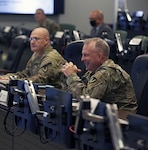 Lt. Gen. Douglas M. Gabram (right), commanding general, U.S. Army Installation Management Command, speaks with Gen. Edward Daly (left), commanding general, Army Materiel Command, Sept. 25 in the IMCOM Operations Center at Joint Base San Antonio-Fort Sam Houston. Daly came to IMCOM to collaborate with and provide guidance to the command’s leadership.