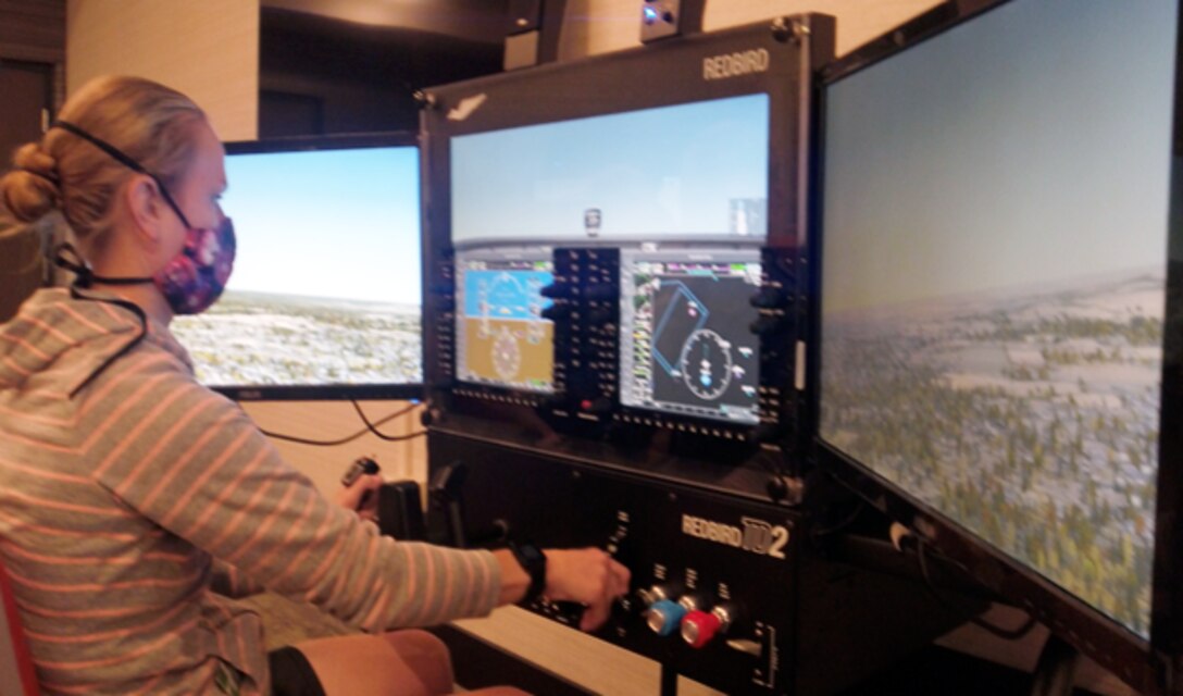 Capt. Kayla Pipe practices on a Civil Air Patrol flight simulator. CAP is one of the four partners in the Air Force Total Force. Consisting of CAP as the Air Force auxiliary as well as the Air National Guard, Air Force Reserve and active-duty Air Force, each partner has specific missions that often foster collaboration. (U.S. Air Force courtesy photo)