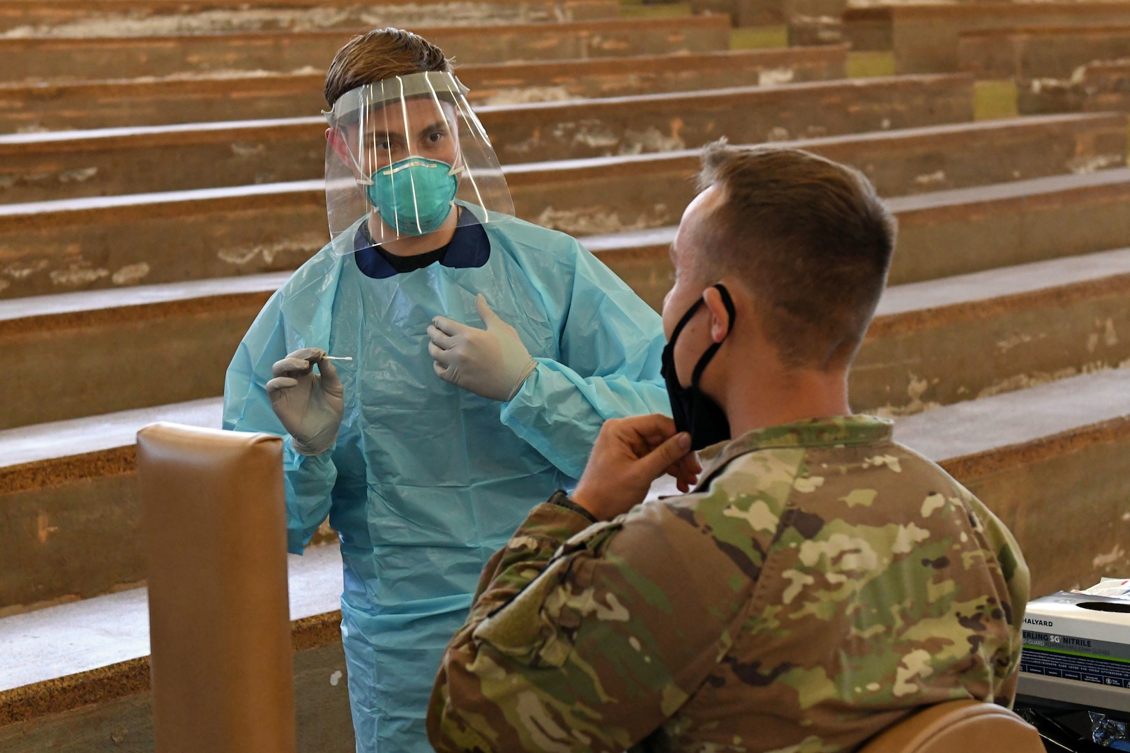 Sailor explains testing procedure to Soldier.