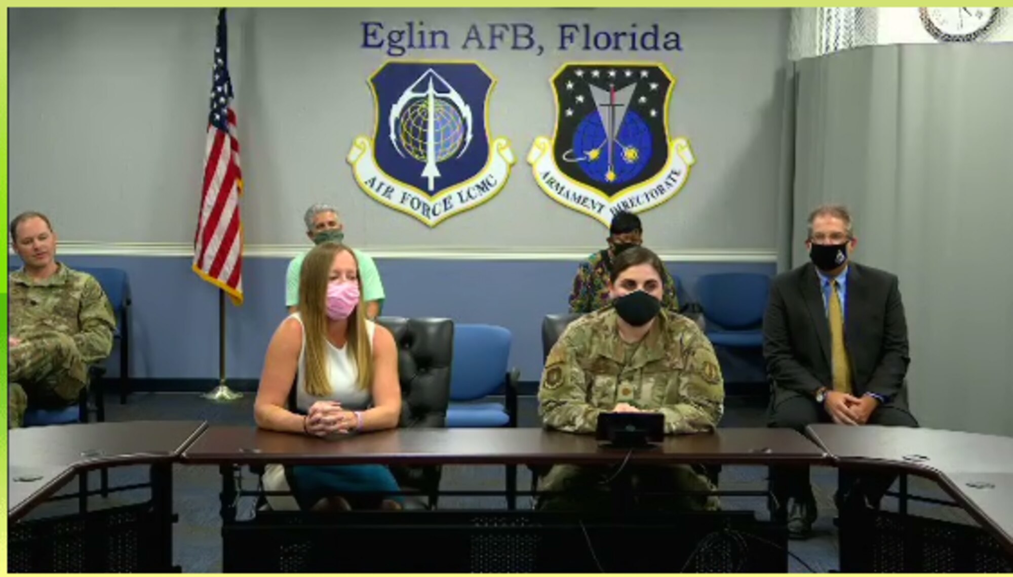 PM Maj. Jensen and CO Dana Alexander at Eglin AFB during a virtual coining ceremony featuring Dr. Will Roper.