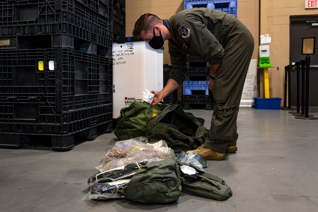 A photo of a customer emptying a bag of equipment