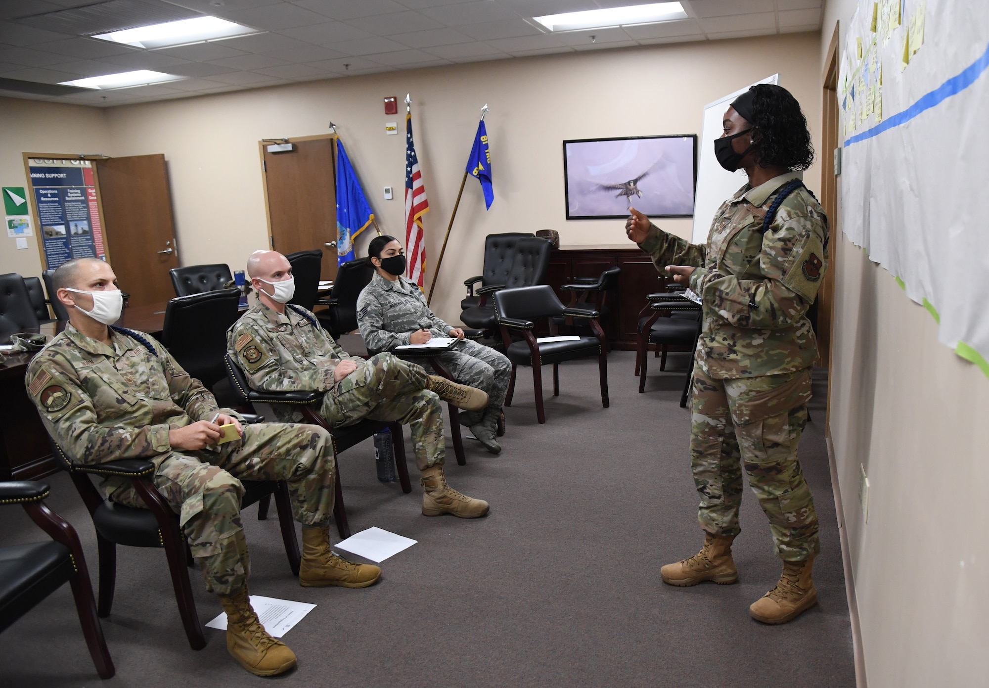 U.S. Air Force Tech. Sgt. Shandresha Mitchell, 335th Training Squadron military training leader, briefs attendees during the Continuous Process Improvement workshop inside Matero Hall at Keesler Air Force Base, Mississippi, October 1, 2020. The workshop included 81st Training Group military training instructors discussing ways of improvement for current procedures being followed by focusing on maximizing value, minimizing waste, sharing best practices and standardizing across the 81st TRG whenever and where ever possible. (U.S. Air Force photo by Kemberly Groue)