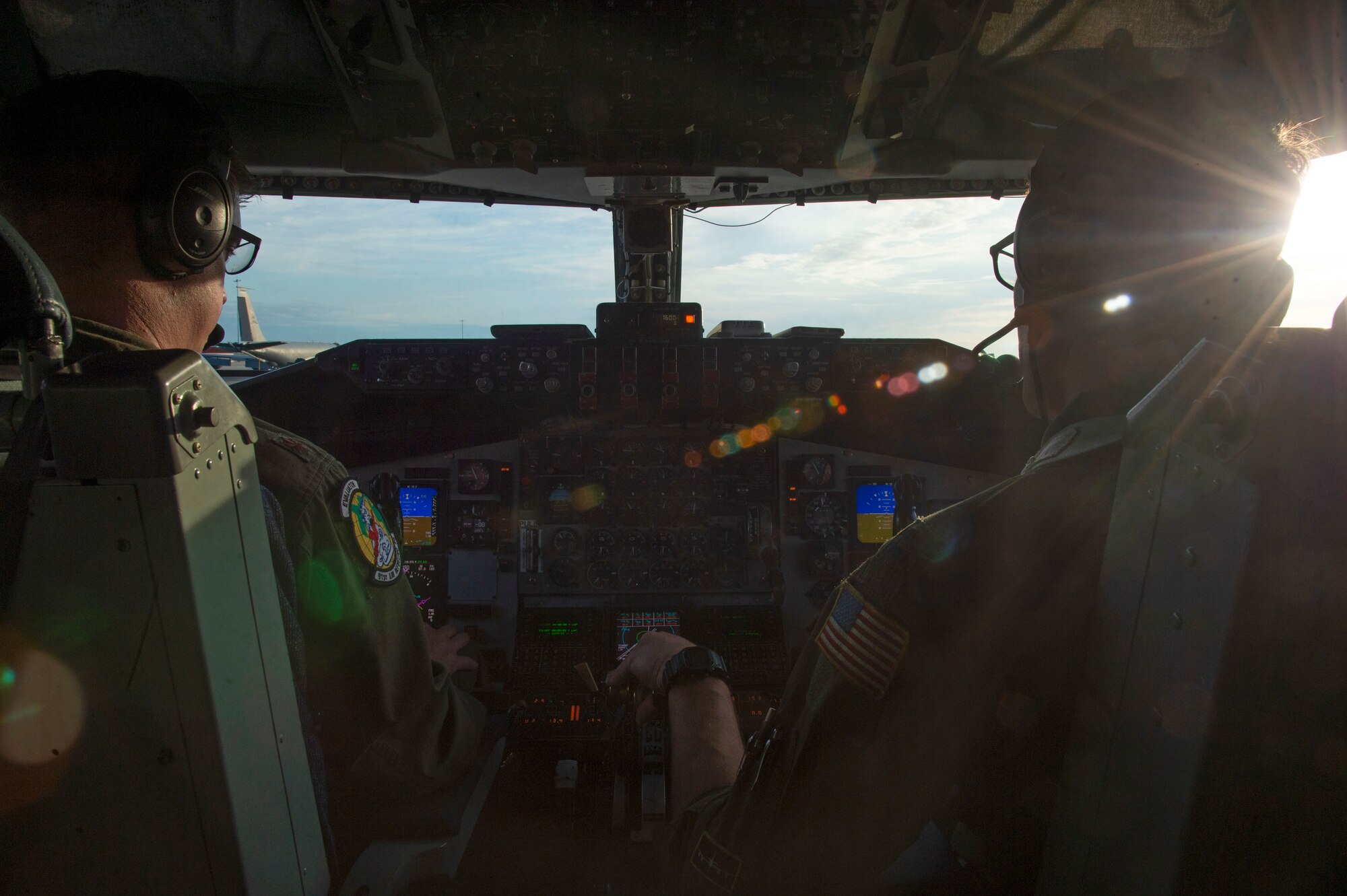 U.S. Air Force Maj. Doug Karl and Capt. Richard Hall, both pilots assigned to the 91st Air Refueling Squadron, operate controls of a KC-135 Stratotanker, during a training mission, Sept. 30, 2020, at MacDill Air Force Base, Fla.