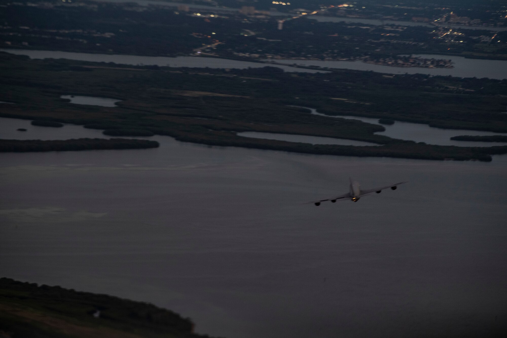 A KC-135 Stratotanker aircraft, assigned to MacDill Air Force Base, begins its approach for a flyover of Raymond James Stadium in Tampa, Fla., Sept. 30, 2020.