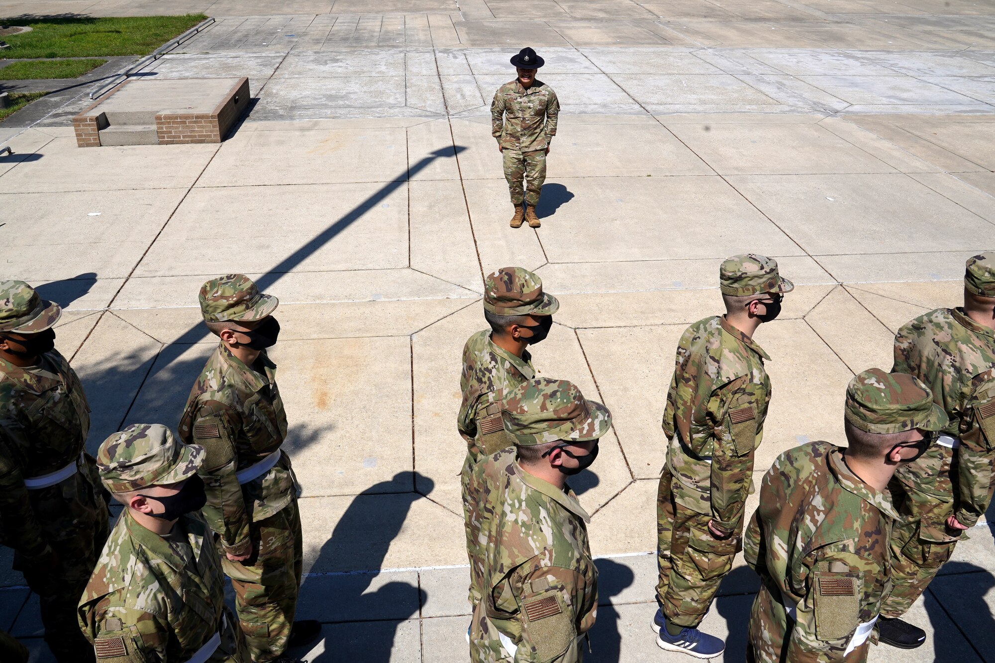 U.S. Air Force Tech. Sgt. Marcos Garcia, 37th Training Wing Detachment 5 military training instructor, marches basic military training trainees outside Erwin Manor at Keesler Air Force Base, Mississippi, Oct. 1, 2020. Garcia showcases the need for diversity by encouraging those he supervises to embrace the cultures of others in the military to help make a stronger Air Force. (U.S. Air Force photo bus Airman 1st Class Seth Haddix)