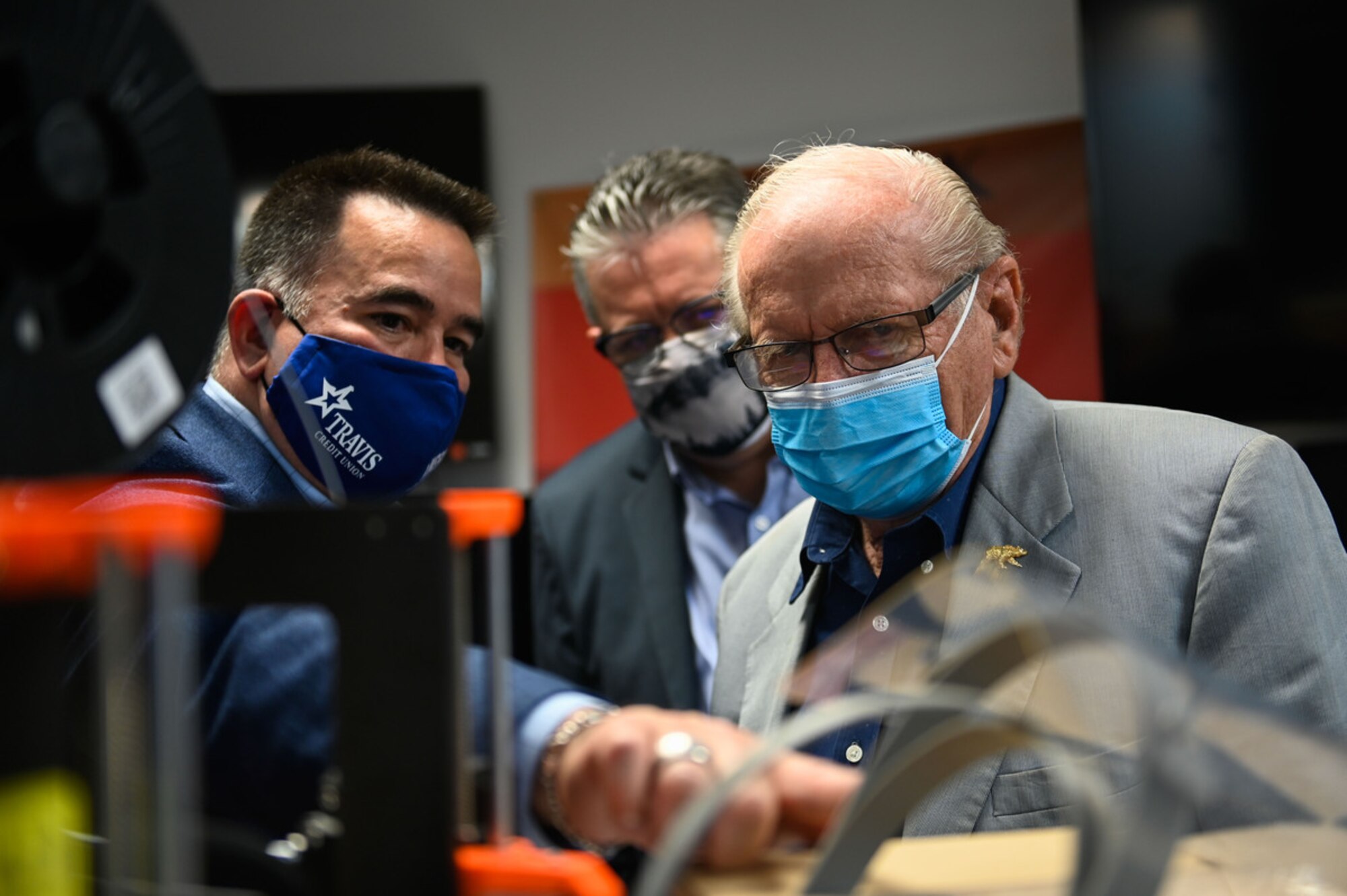 Airman holds 3D-printed award