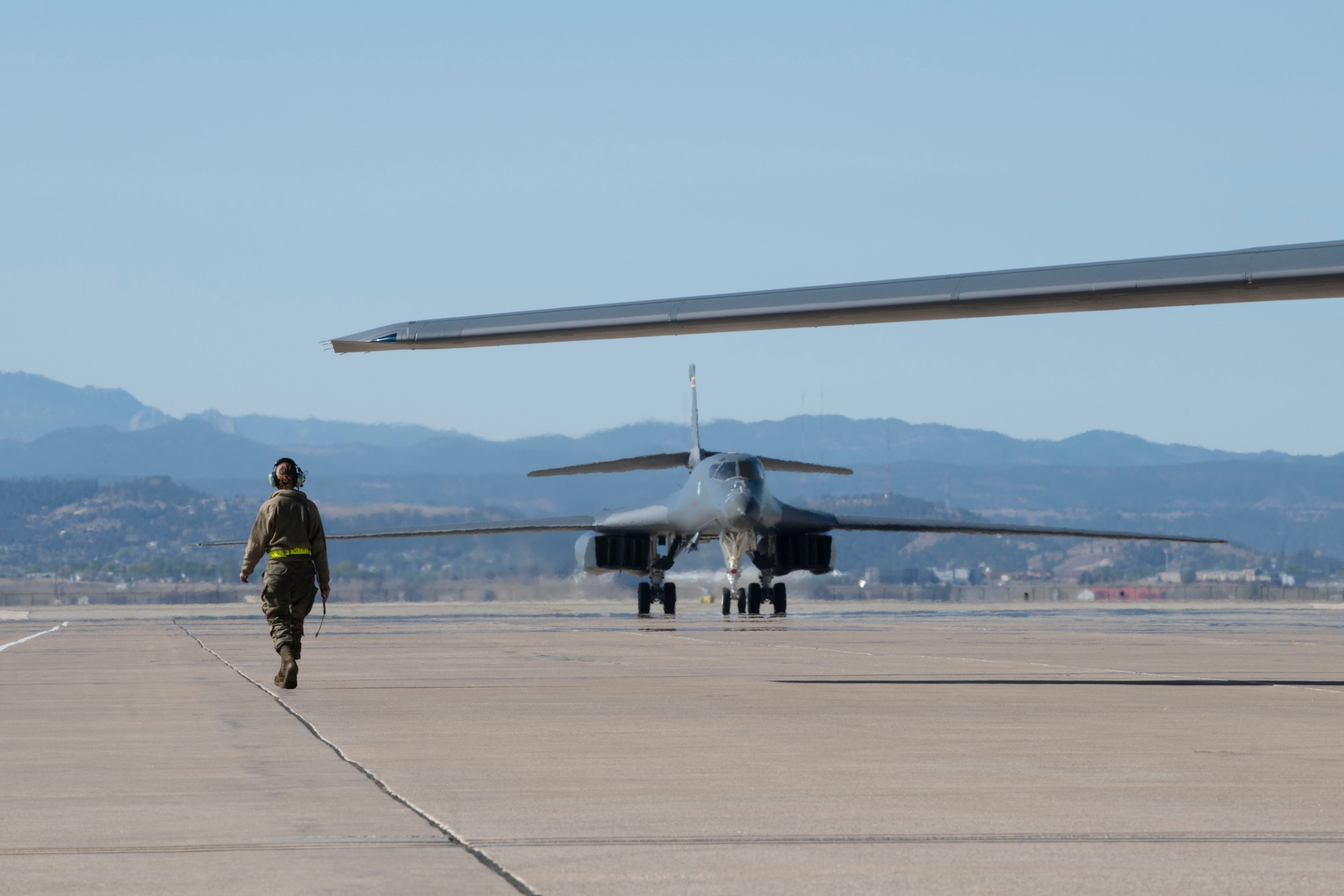 Two B-1B Lancers taxi on the runway at Ellsworth Air Force Base, S.D., after completing a Bomber Task Force deployment, Oct. 1, 2020. Bomber Task Force missions provide a persistent bomber presence in the Indo-Pacific theater and around the globe. (U.S. Air Force photo by Airman 1st Class Christina Bennett)