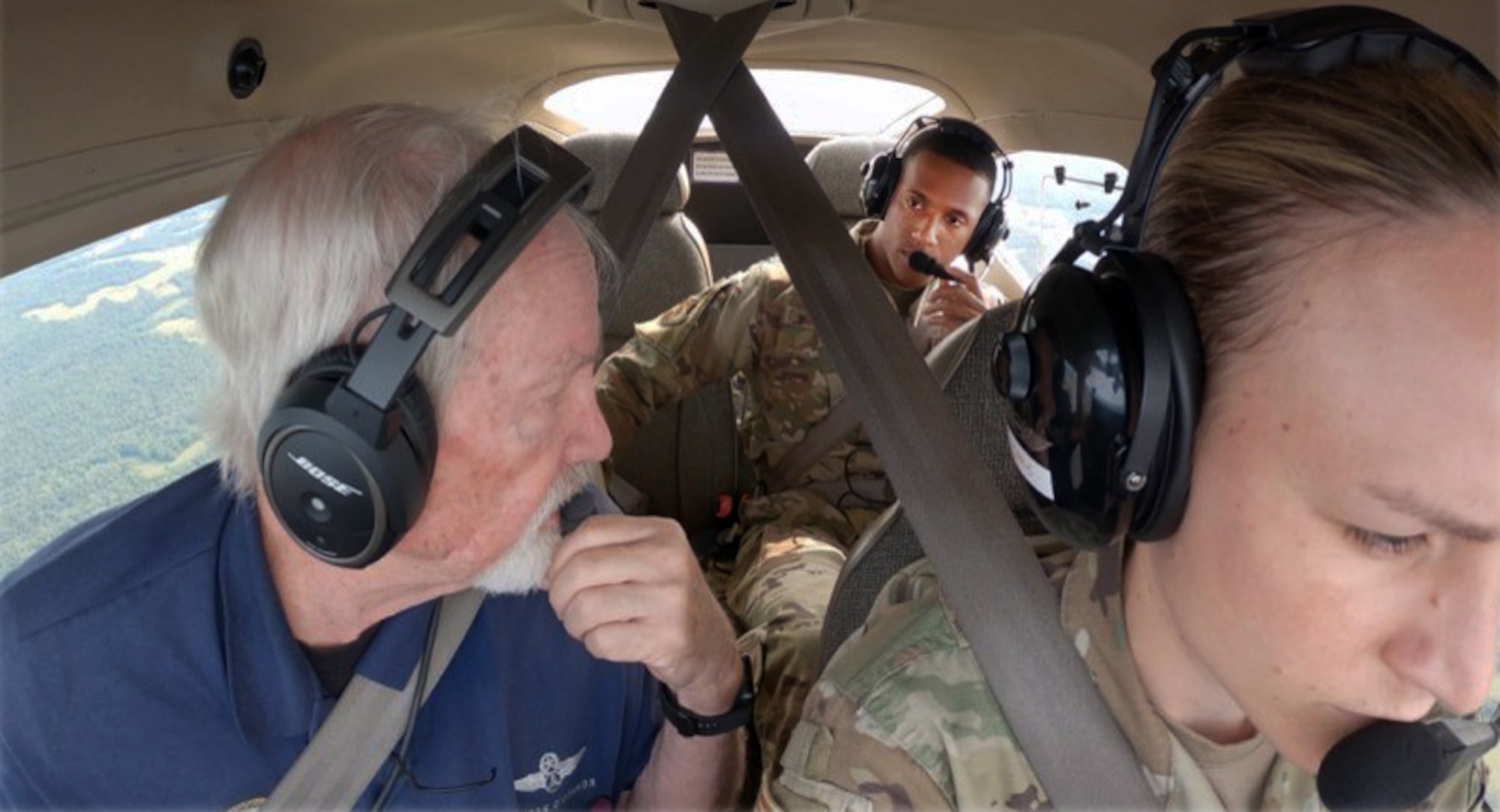 Civil Air Patrol Capt. Thomas O’Connor speaks with 2nd Lt. Sedacy Walden (center rear) as Capt. Kayla Pipe pilots their CAP Cessna. Launched in 2019 as an experimental initiative, the Rated Preparatory Program, or RPP, provides accelerated instruction that identifies future pilots, navigators and other crew members to help address the Air Force’s potential pilot shortage. (U.S. Air Force courtesy photo)